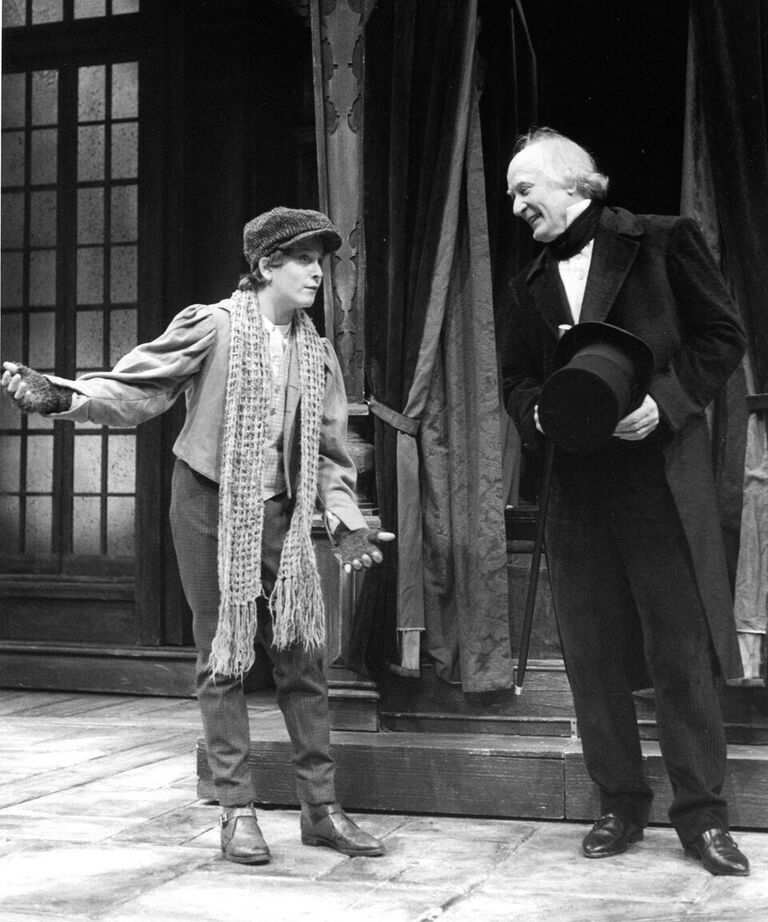 In the 1997 production Sam Rosenthal (left) portrayed George and Joneal Joplin (right) took over the role of Ebenezer Scrooge.